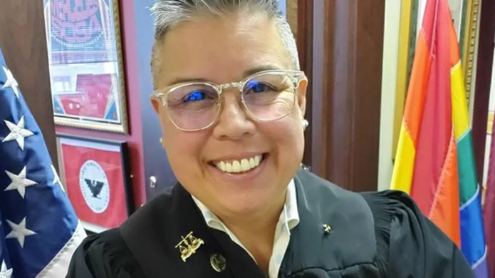 Bexar County Judge Rosie Speedlin-Gonzalez in courtroom, highlighting unlawful restraint charges.