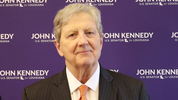 Distinguished man in a suit on news in the US segment.