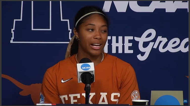 Austin news: Female athlete speaking at sports press conference.