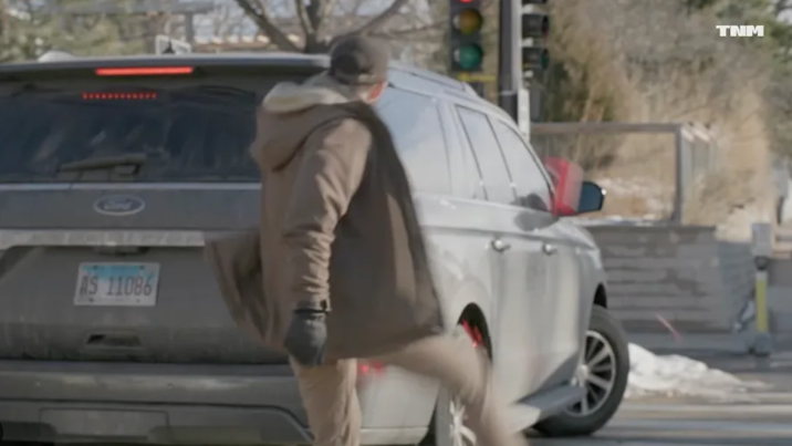 Vibrant memorial site with colorful art and flowers, messages honoring Alex Pretti.