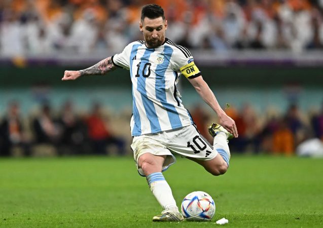 Football coach discusses Messi GOAT debate in a press conference.