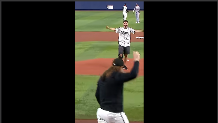 Billy Gilmour throws first pitch in Miami stadium.