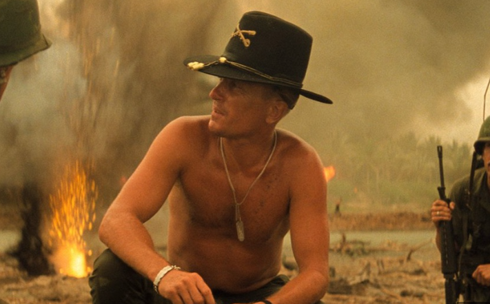 Elderly man in rustic attic discussing passionately, Robert Duvall legacy films.