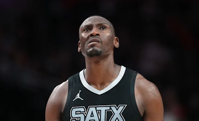 San Antonio Spurs game excitement with player celebration.