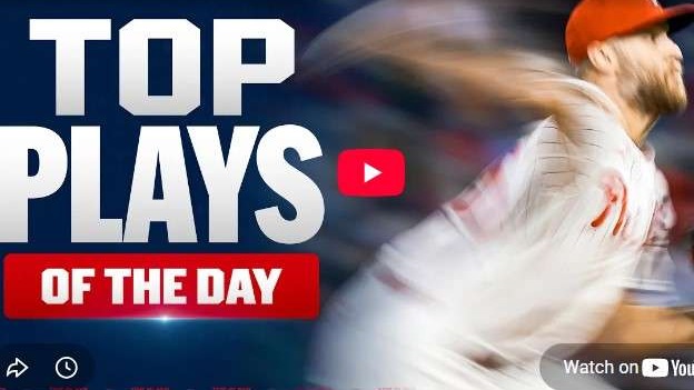 Zack Wheeler 2000 strikeouts celebration, dynamic baseball pitch.