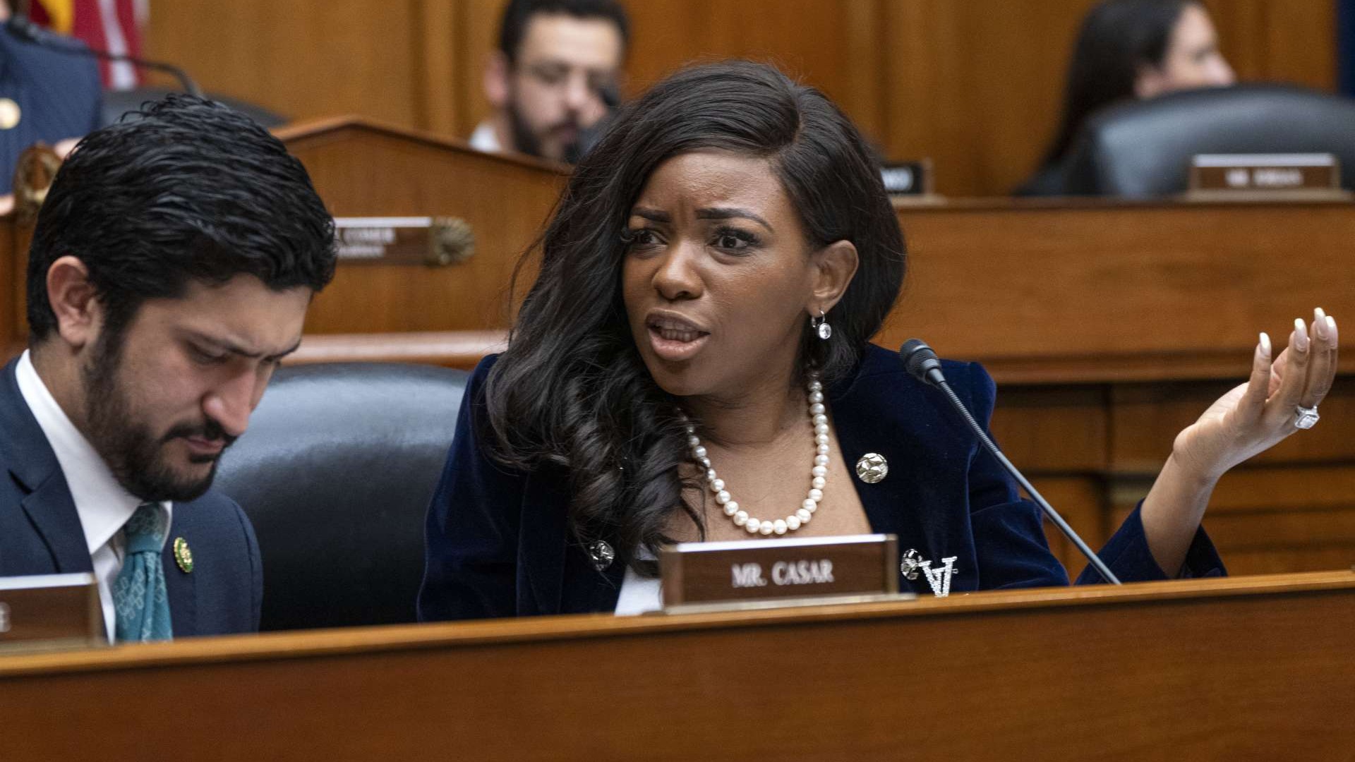Contrasting portrait of man and woman, serious expressions.