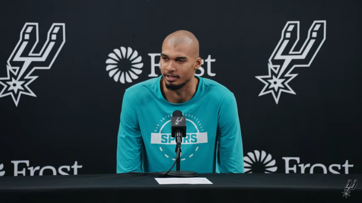 Focused player demonstrates the importance of attention to detail in sports.