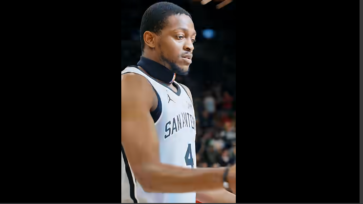 San Antonio Spurs news: Intense basketball game action with focused players.