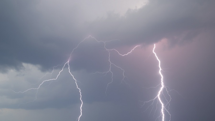 Thunderstorm and rain during San Antonio storm forecast for community safety.